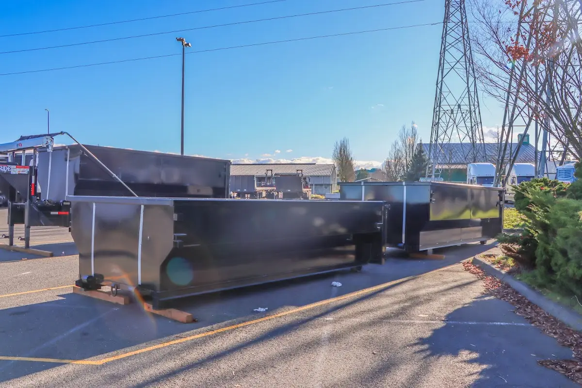 Roll-off dumpster ready for waste disposal at job site for Demolition Dumpster Rental in Yulee